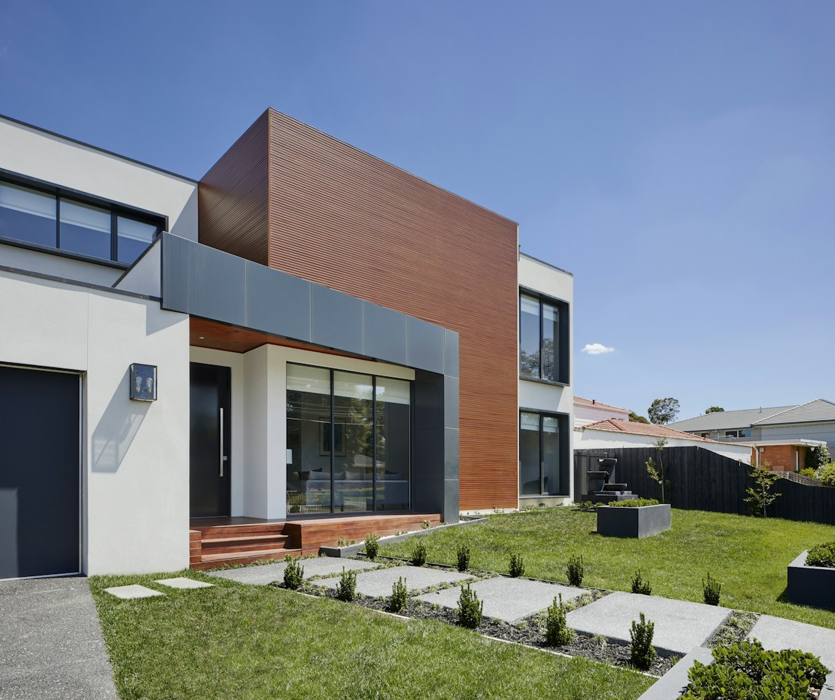 Luxury modern house exterior with clean white facade