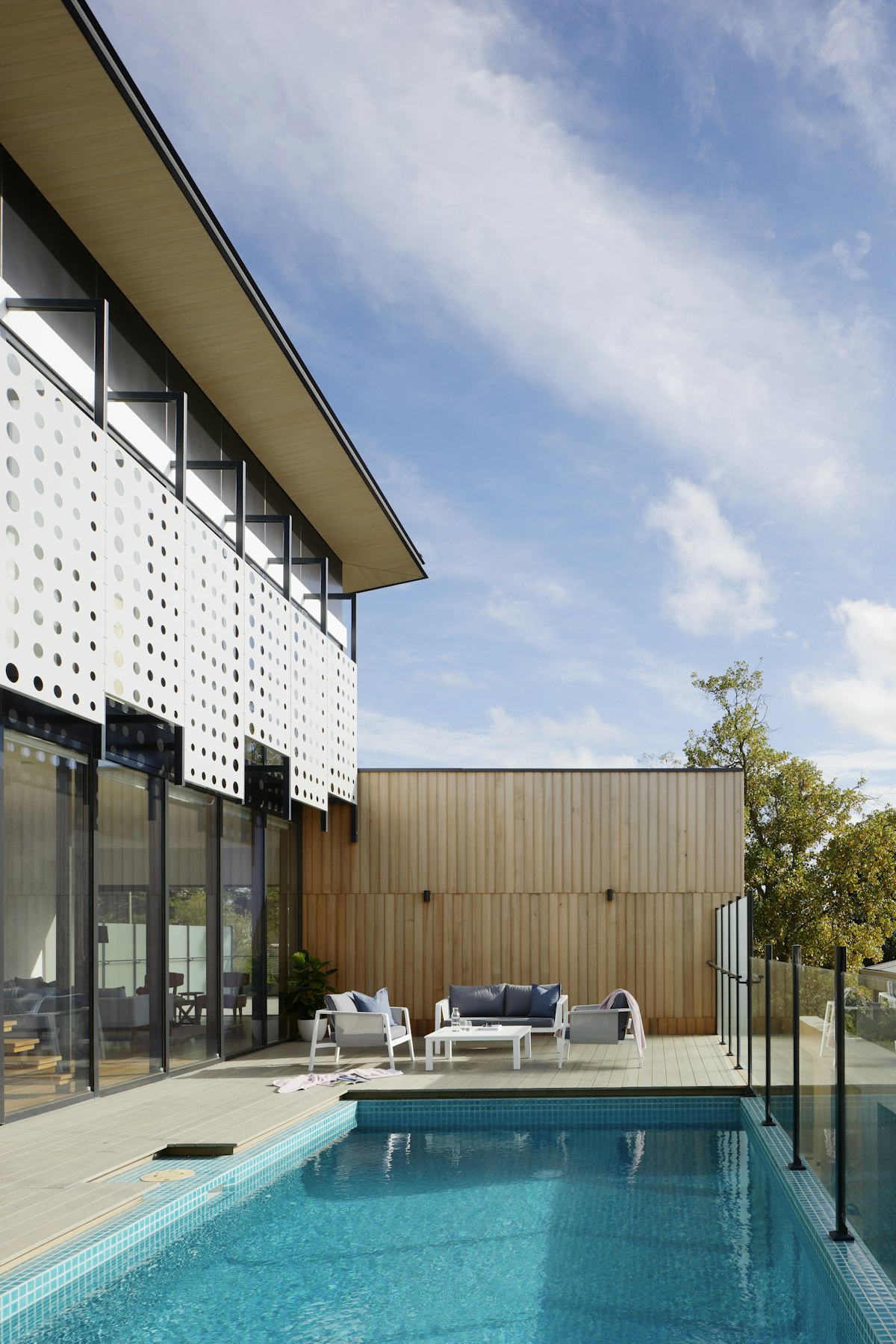 Contemporary villa with stone walls and landscaped garden